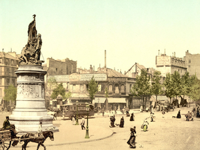 Street scene and monument, in the Place Clichy, Paris, France