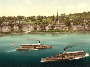 Promenade and cathedral, with two small steamers, Lucerne, Switzerland